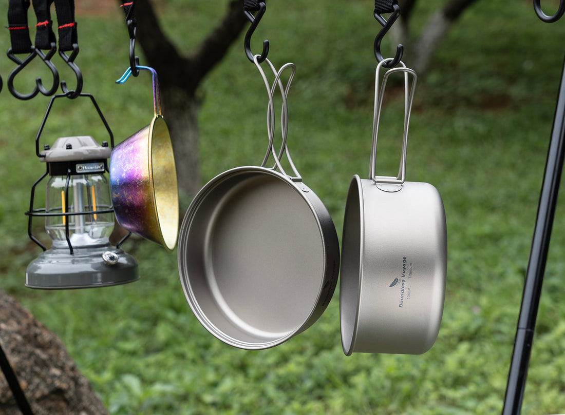 Boundless Voyage titanium cookware being cleaned outdoors