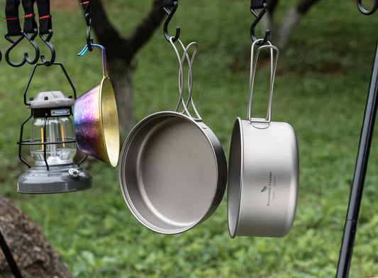 Boundless Voyage titanium cookware being cleaned outdoors