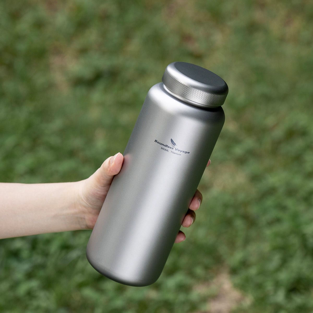 Titanium water bottle with screw lid for hiking and daily carry