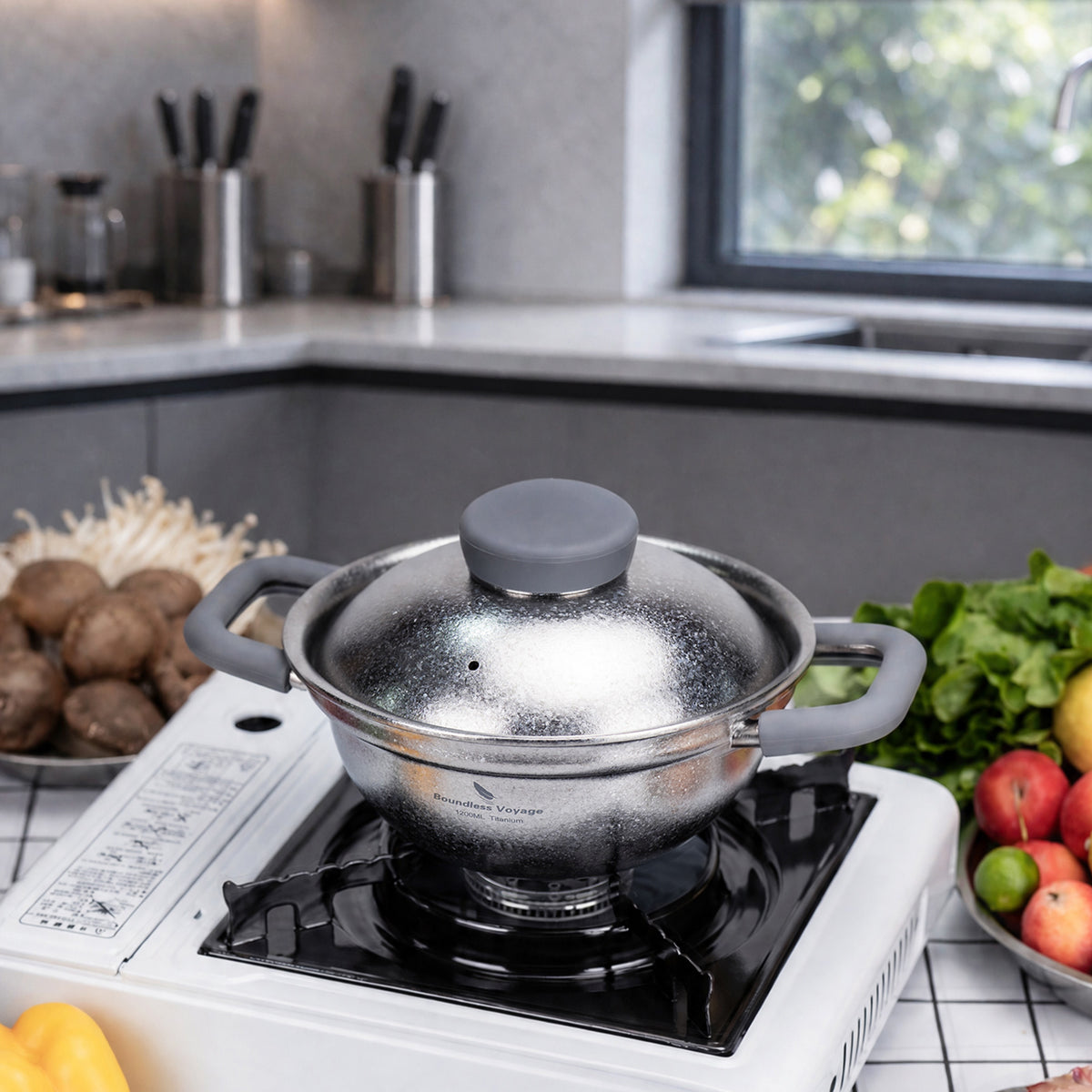 Boundless Voyage Ti2118C compact titanium cooking pot sitting on countertop stove