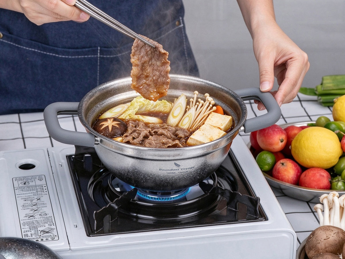 Cooking beef hot pot sukiyaki with tofu and mushrooms in Boundless Voyage 1.2L titanium pot