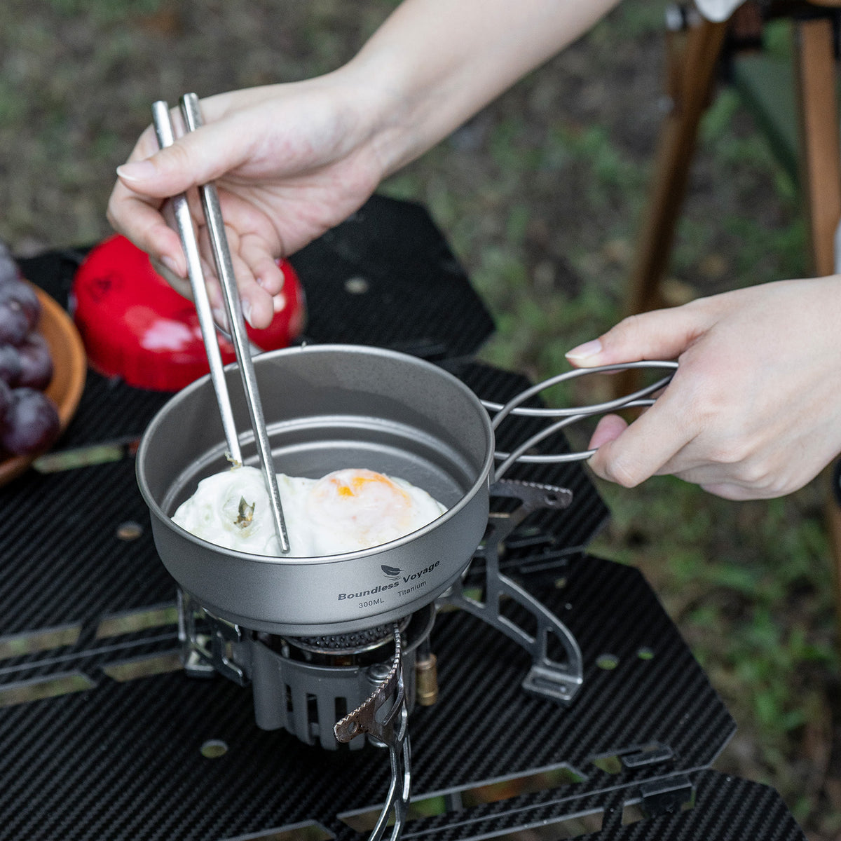 Ti2053C titanium pot cooking meal at campsite