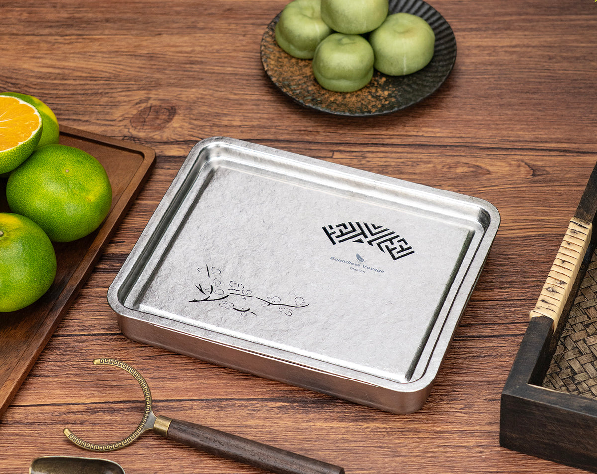 Square titanium tea tray Ti3215D styled with traditional tea ceremony utensils and snacks