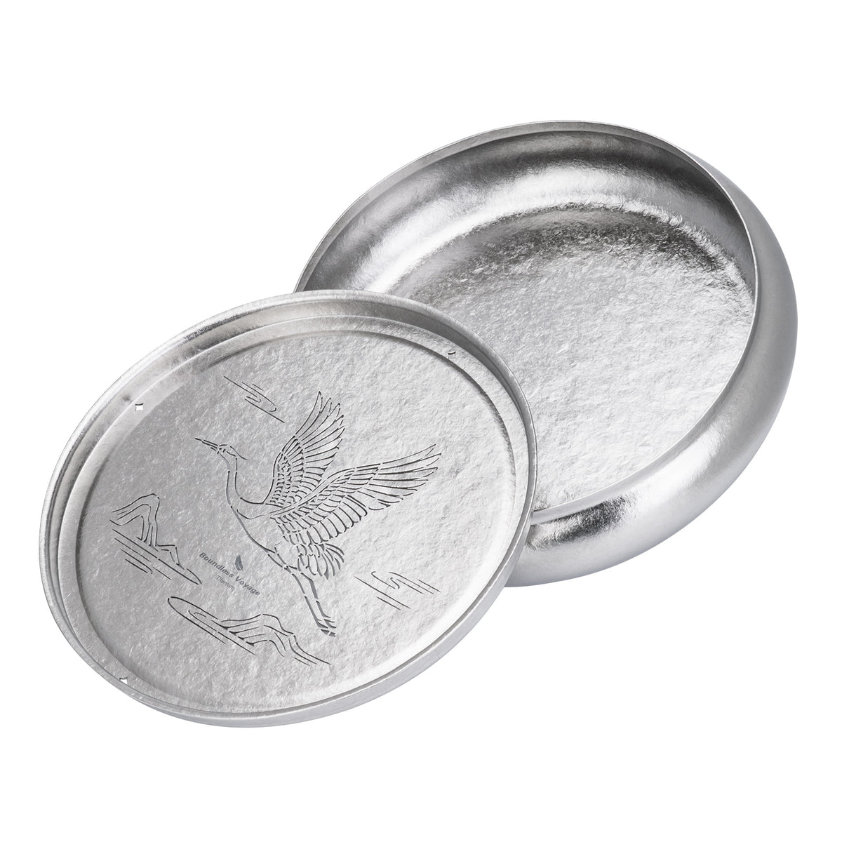 Two-piece round titanium tea tray showing removable top drainage plate and 1300ml base reservoir